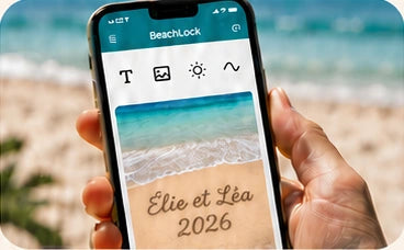 Téléphone affichant la zone de sable du Studio et la gravure Élie et Léa 2026.